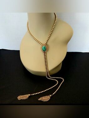 Vintage Gold Tone Metal Ball Lariat Necklace Sign Avon made by Delizza & Elster